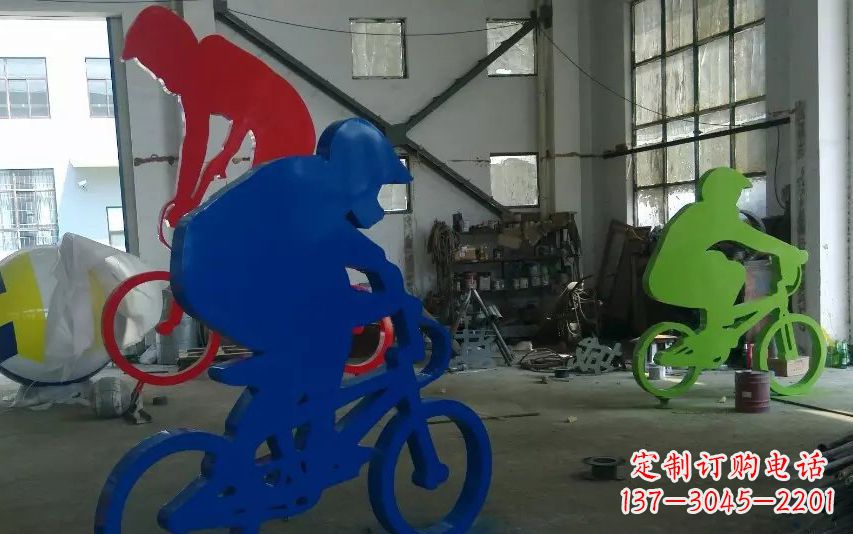 北京不锈钢骑自行车的运动雕塑