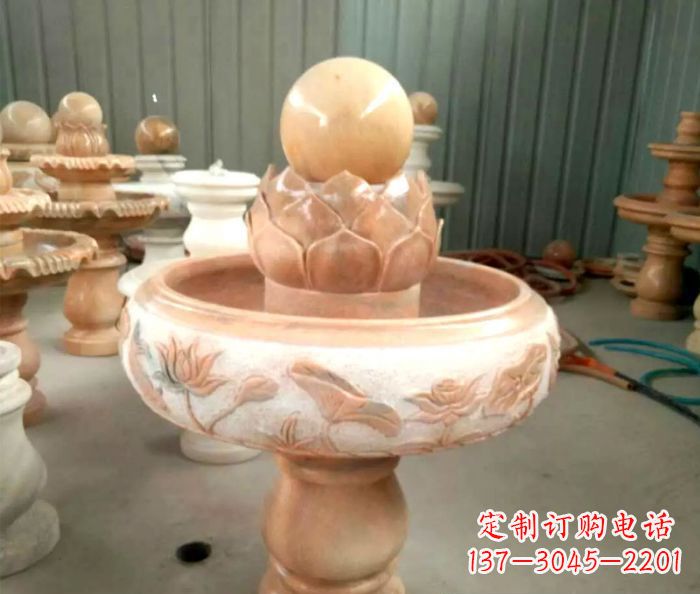 北京石来运转晚霞红风水球喷泉石雕