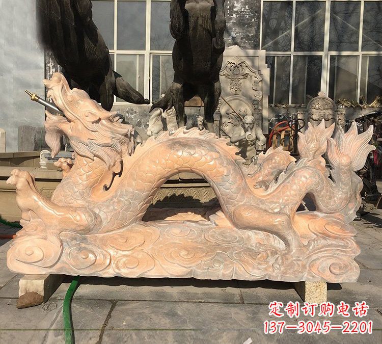 北京晚霞红石雕喷水龙