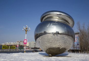 北京陀螺雕塑-户外广场大型景观不锈钢镜面陀螺雕塑